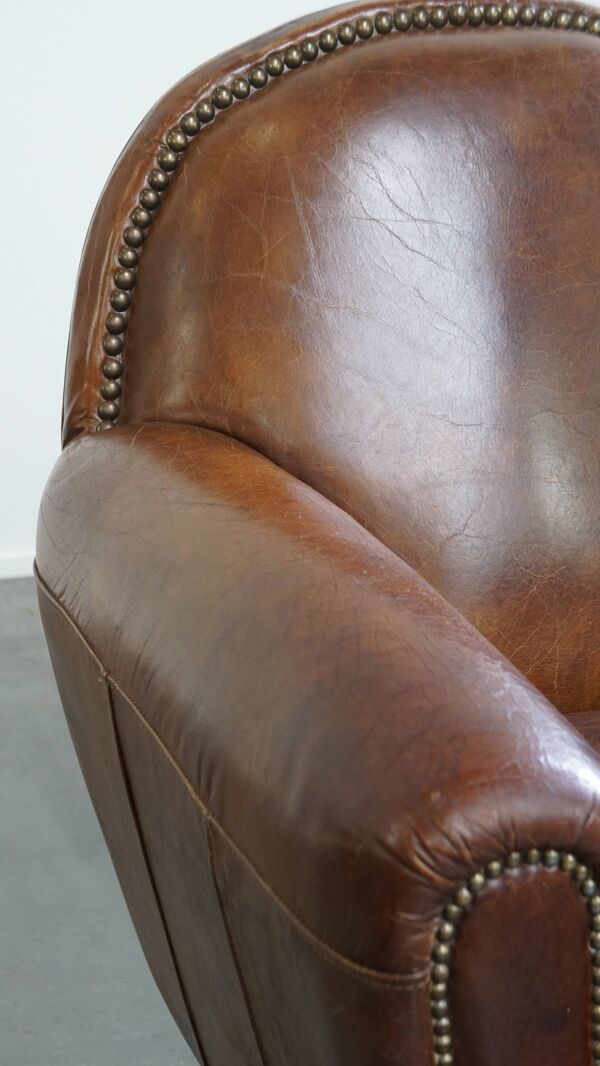 Fauteuil en cuir de vache marron