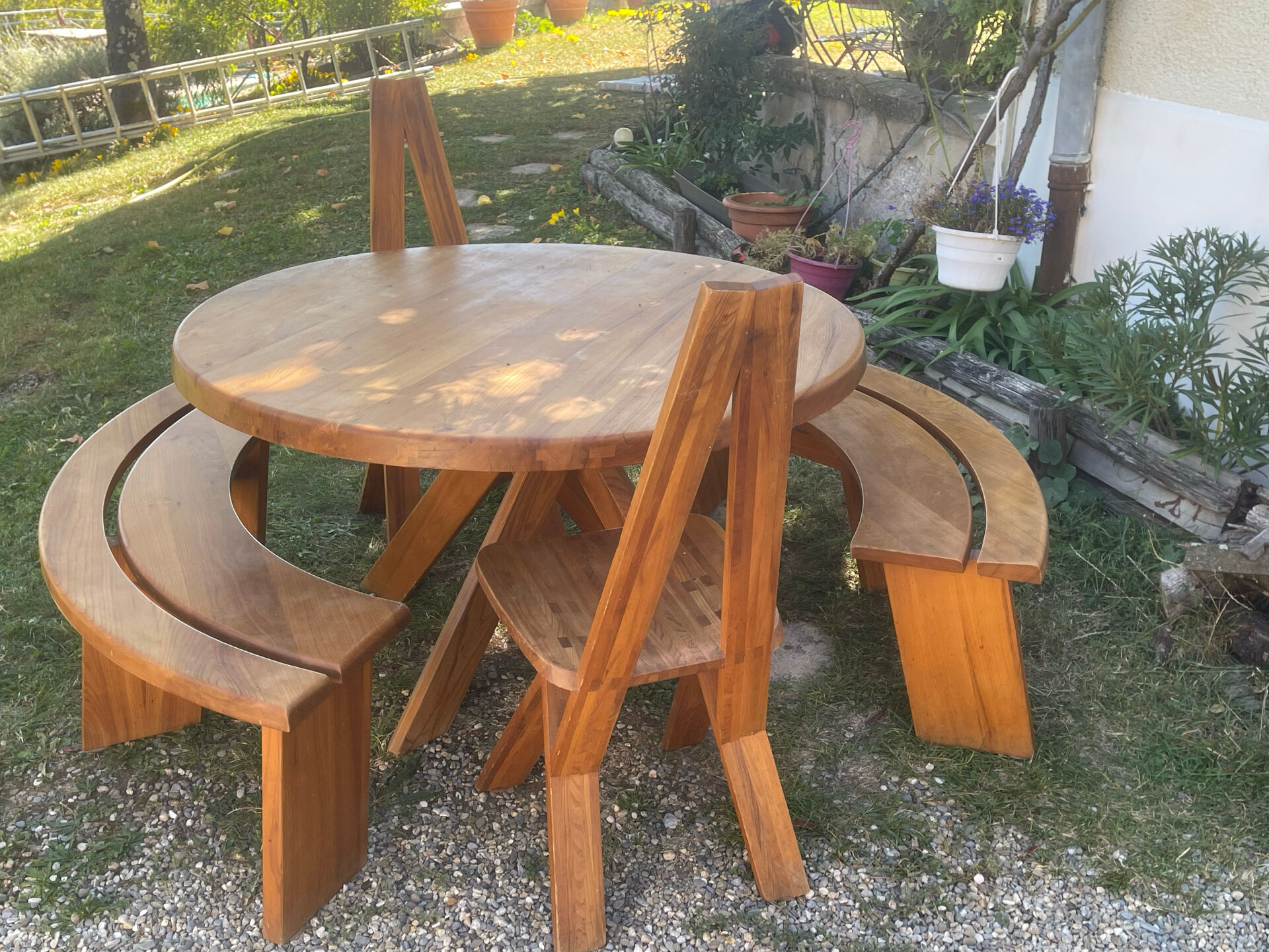 Round table + 2 chairs and 2 rounded benches suitable for the table.