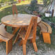 Round table + 2 chairs and 2 rounded benches suitable for the table.