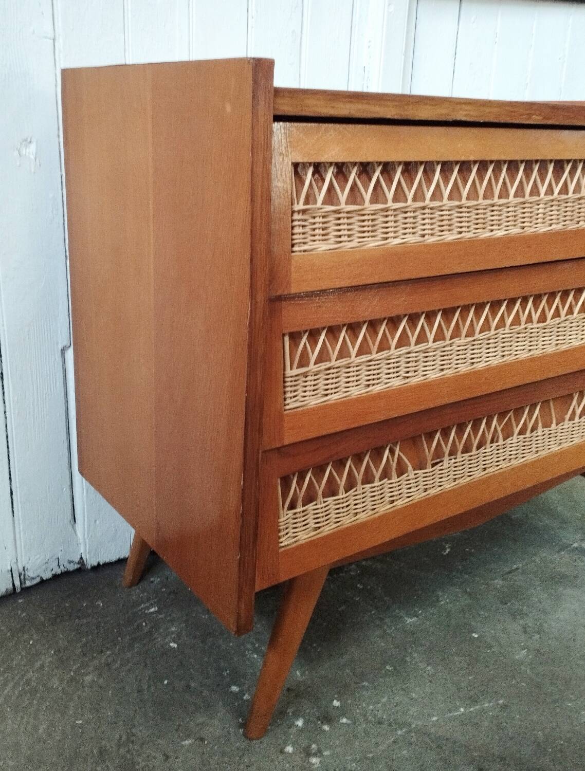 Vintage rattan chest of drawers with compass feet