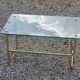 Coffee table from the 60s top glass base metal gilded