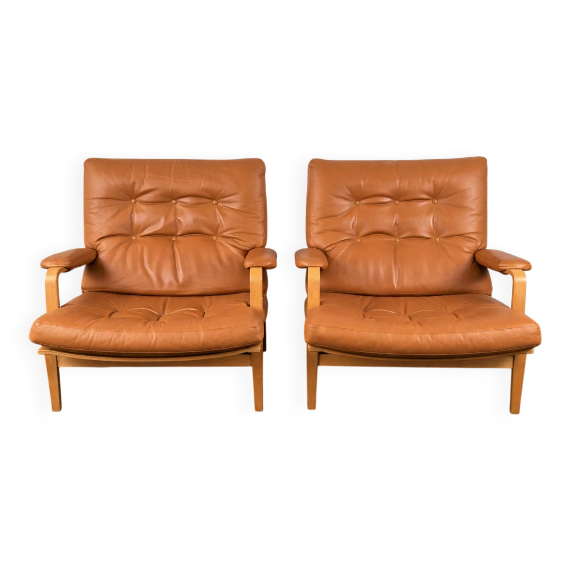 Pair of Ingrid model armchairs in beech and leather by Bruno Mathsson for Dux Ingrid Lounge Chairs, Denmark, 1960.