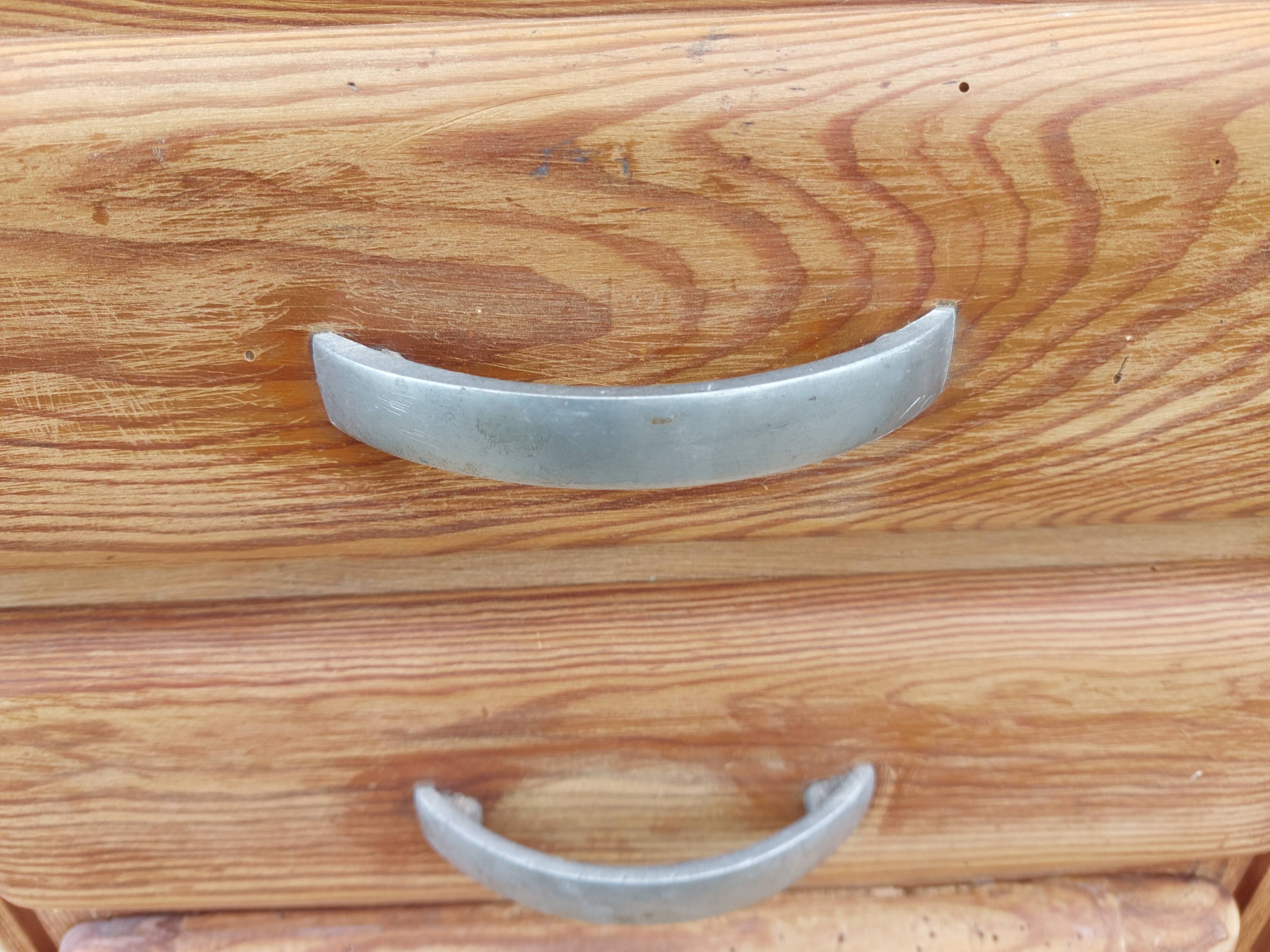 Vintage wooden buffet with a marble top.