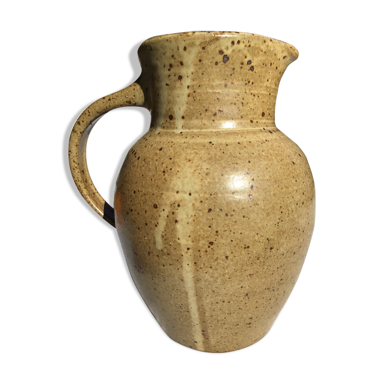 Beige handcrafted speckled sandstone pitcher