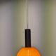 Pair of orange opaline ball pendants by Parscot, France circa 1970.