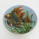 Decorative ceramic wall plate with fish decoration by Puigdemont.