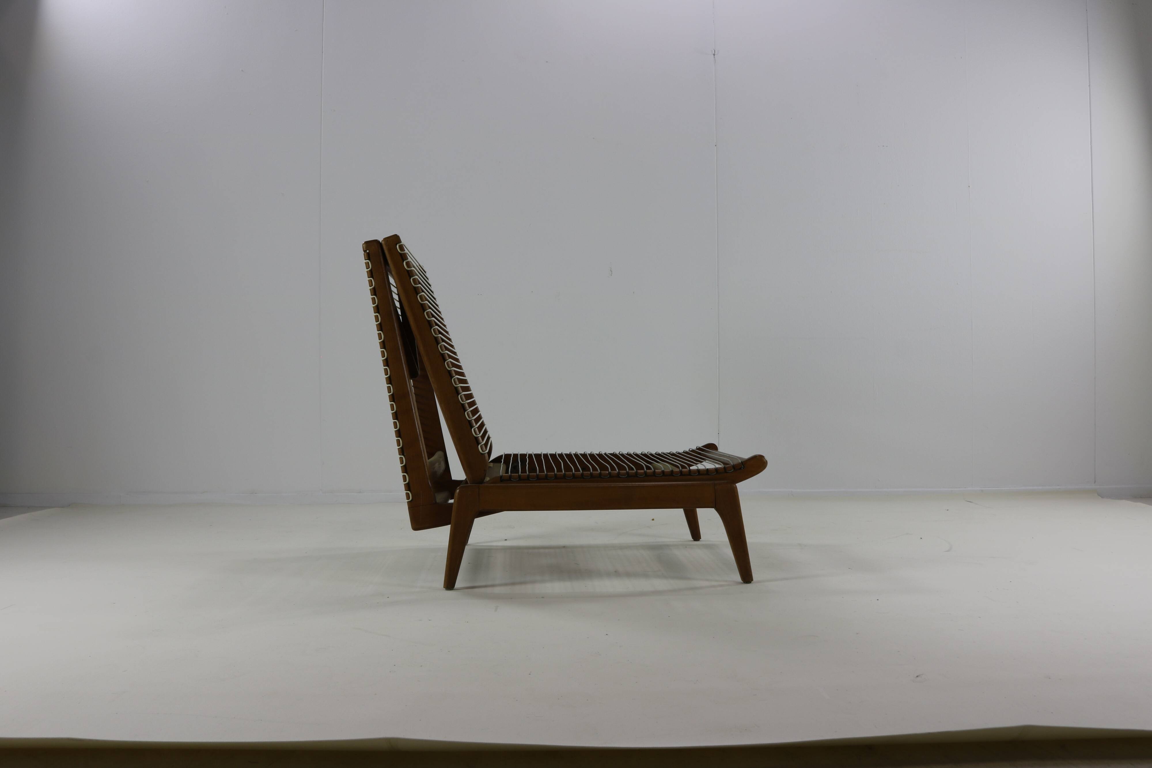 Midcentury french design fauteuil / day bed by George Tigien