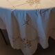 Large old embroidered and openwork tablecloth and 8 napkins.
