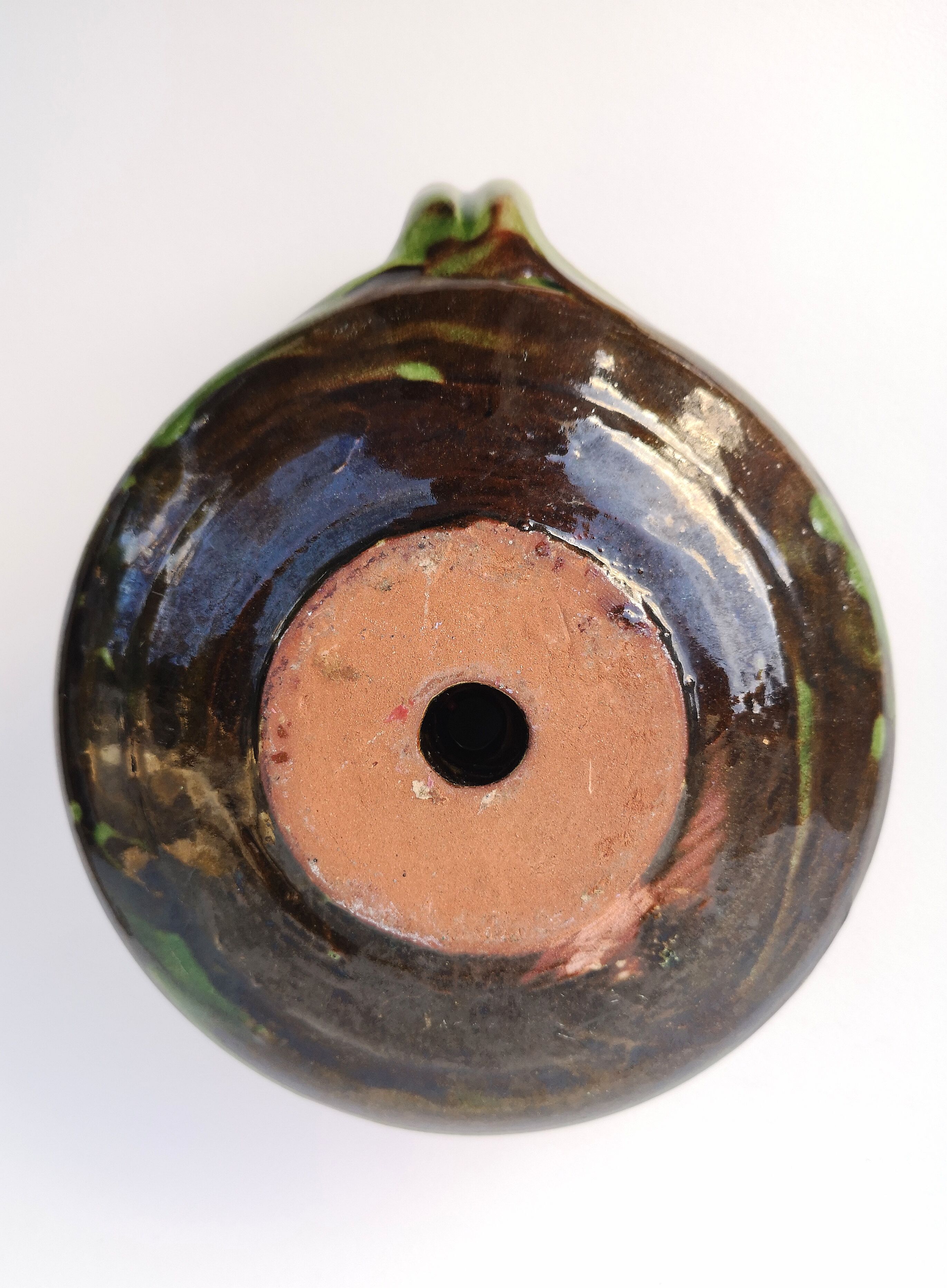 Glazed terracotta candle holder