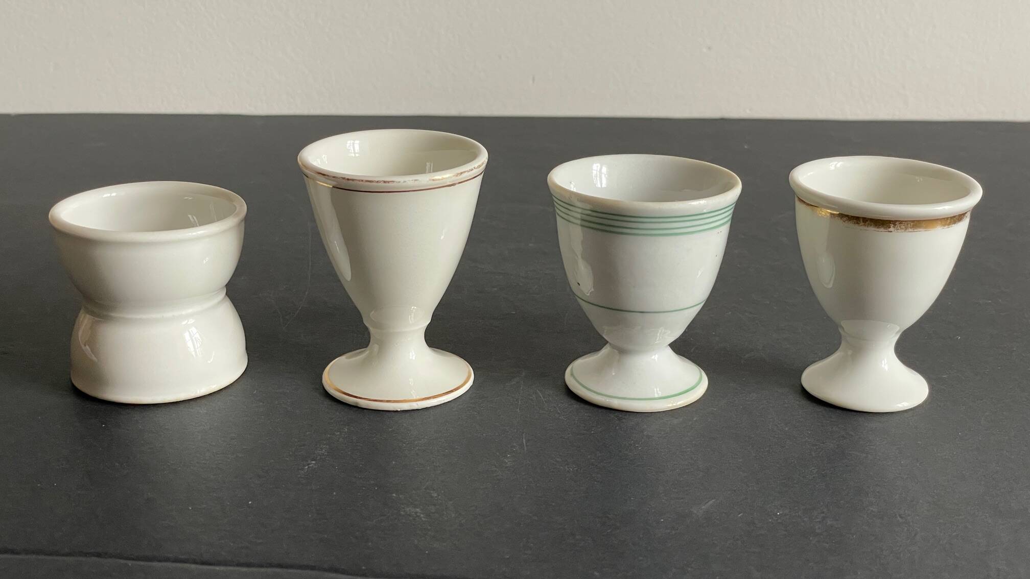 4 antique ceramic egg cups
