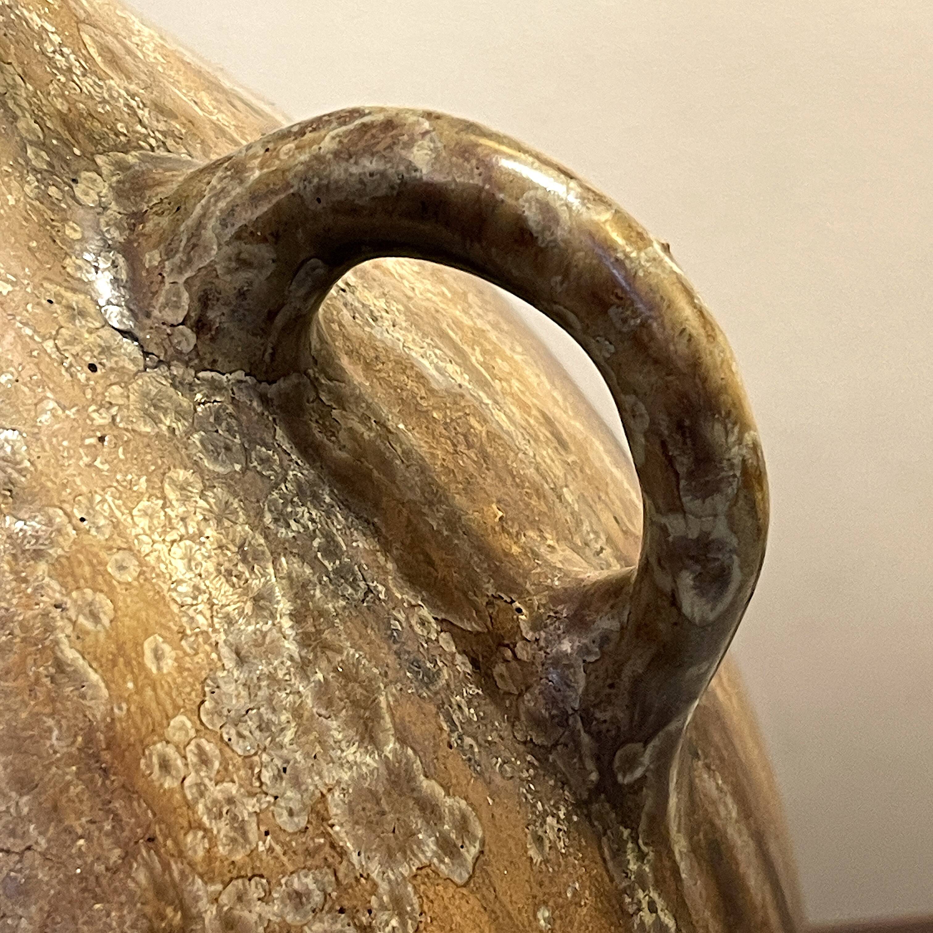 art nouveau brown 'colocynth' vase with three handles, roger guerin