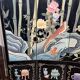 Chinese lacquered screen with decorations of birds and bamboo. Chinese work. Around 1950.