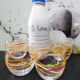 4 vintage Luminarc water glasses with coloured spiral line patterns.