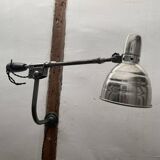 Old industrial wall light with counterweight.