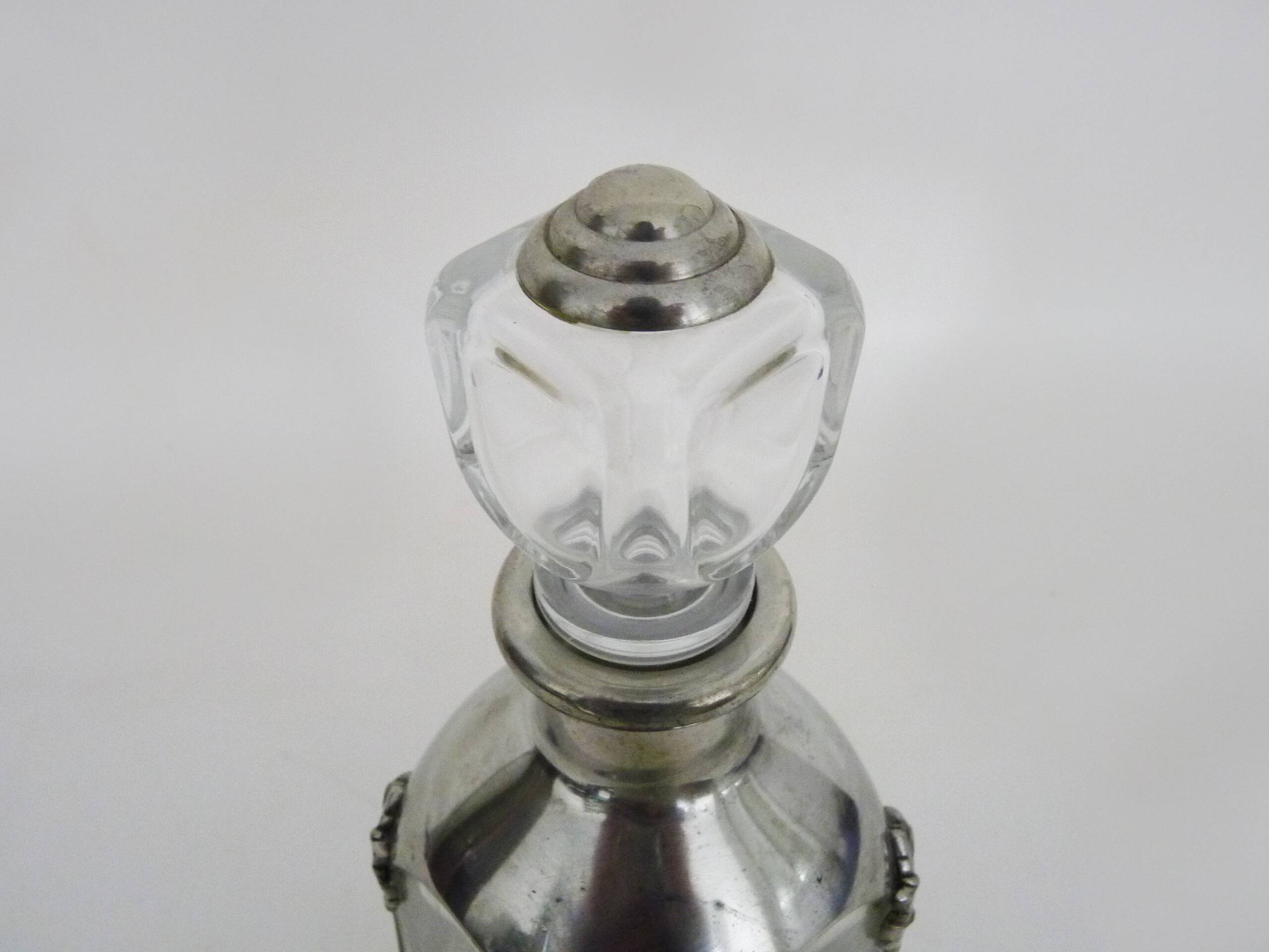Magnificent crystal and silver-plated metal carafe bottle.