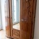 Antique Art Deco wardrobe in carved wood with mirror