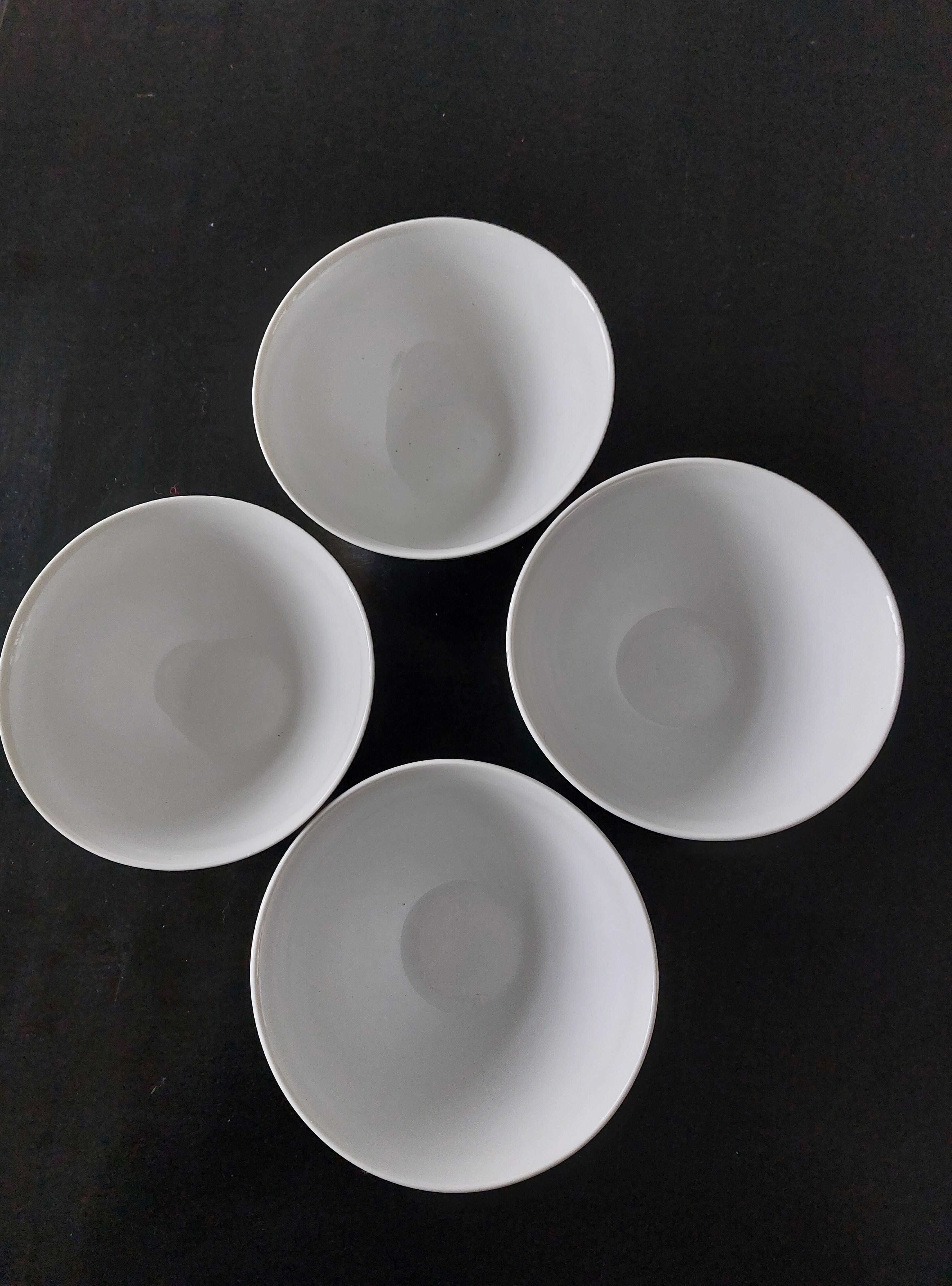 Set of four gingham pattern bowls