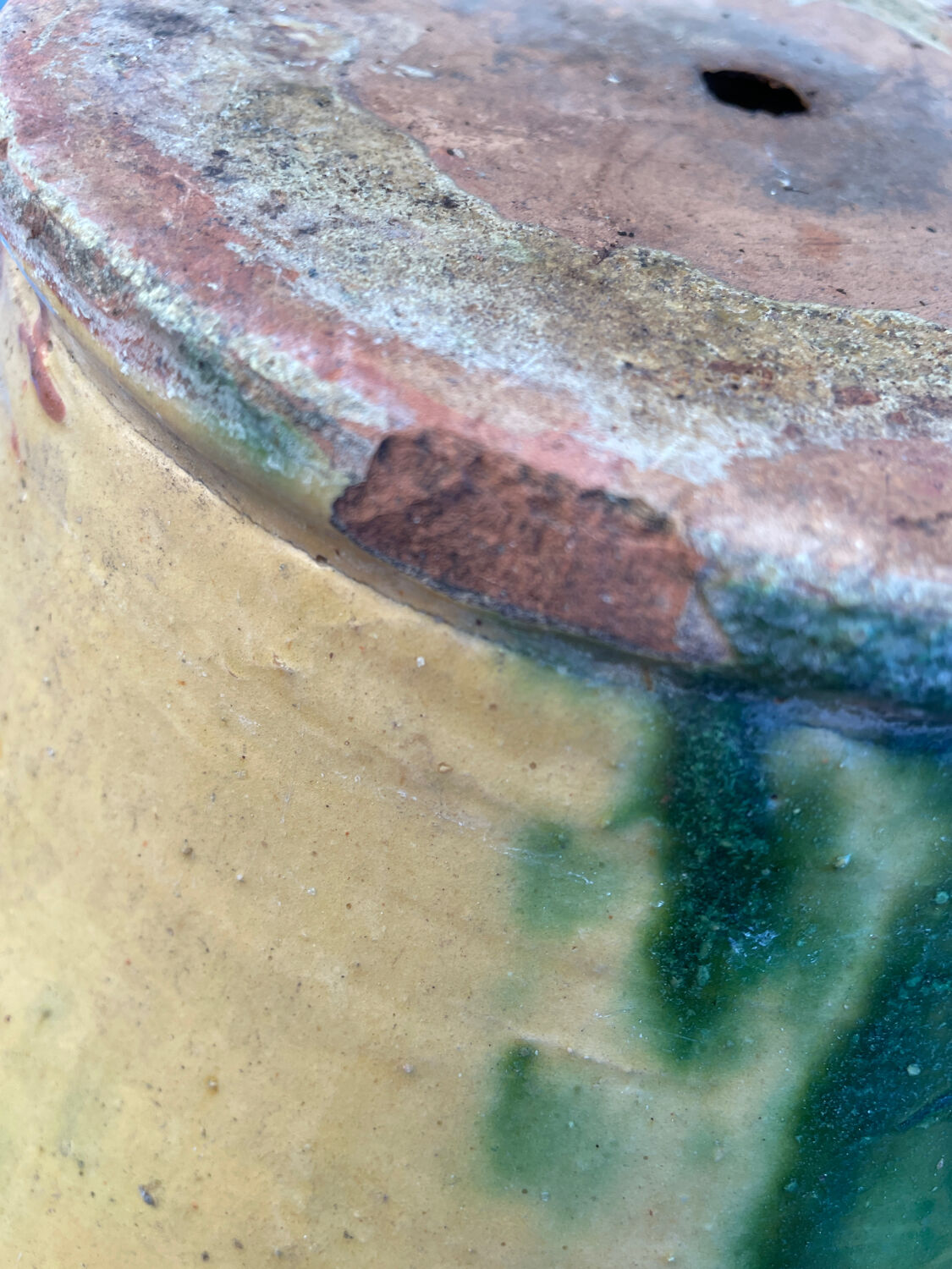 Old glazed terracotta jar