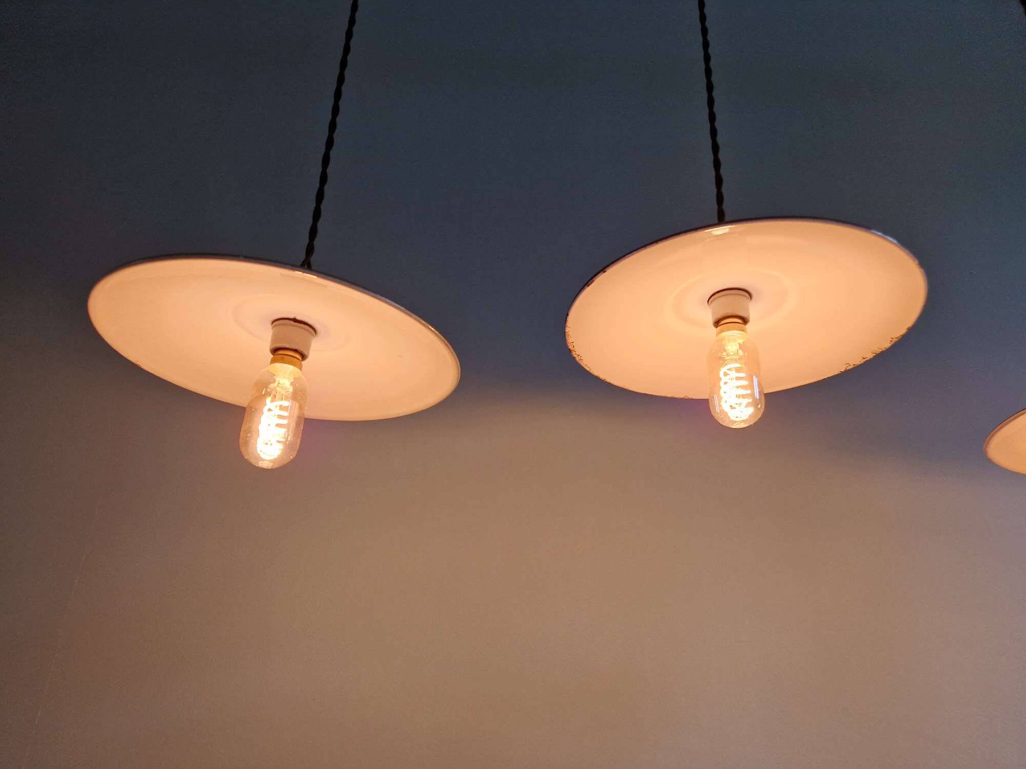 Trio of large industrial suspensions in green enamelled sheet metal.