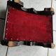 Red velvet footrest or prie-dieu