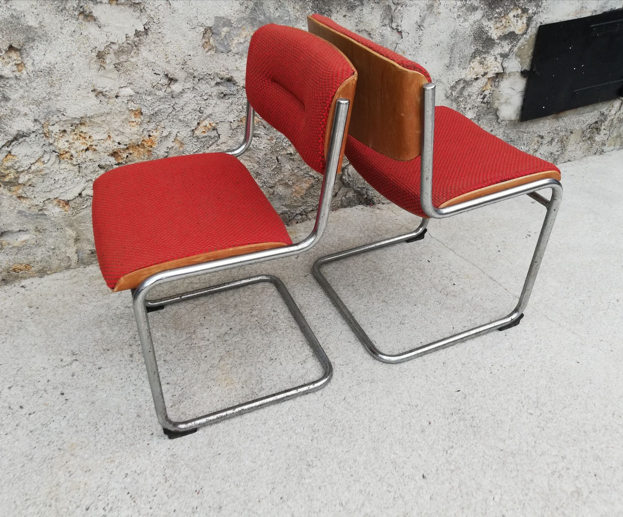 Red chairs cantilever chrome tubes