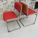 Red chairs cantilever chrome tubes