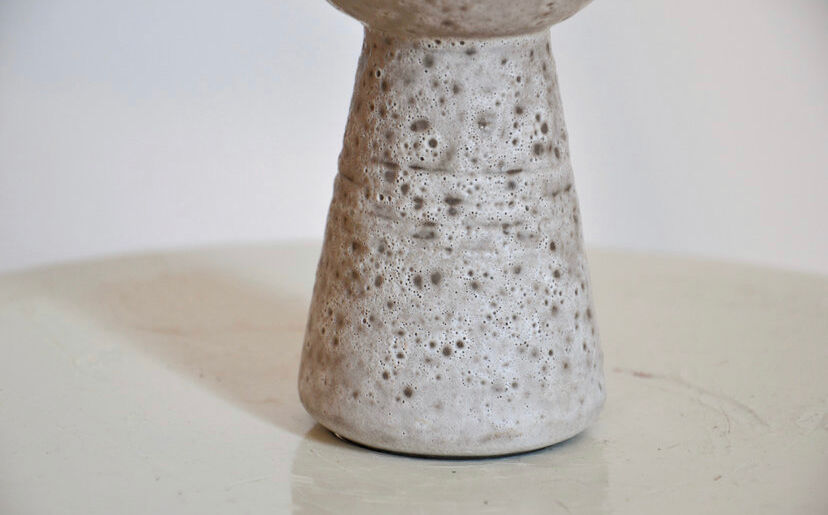 Minimalist gray ceramic vase in design shape