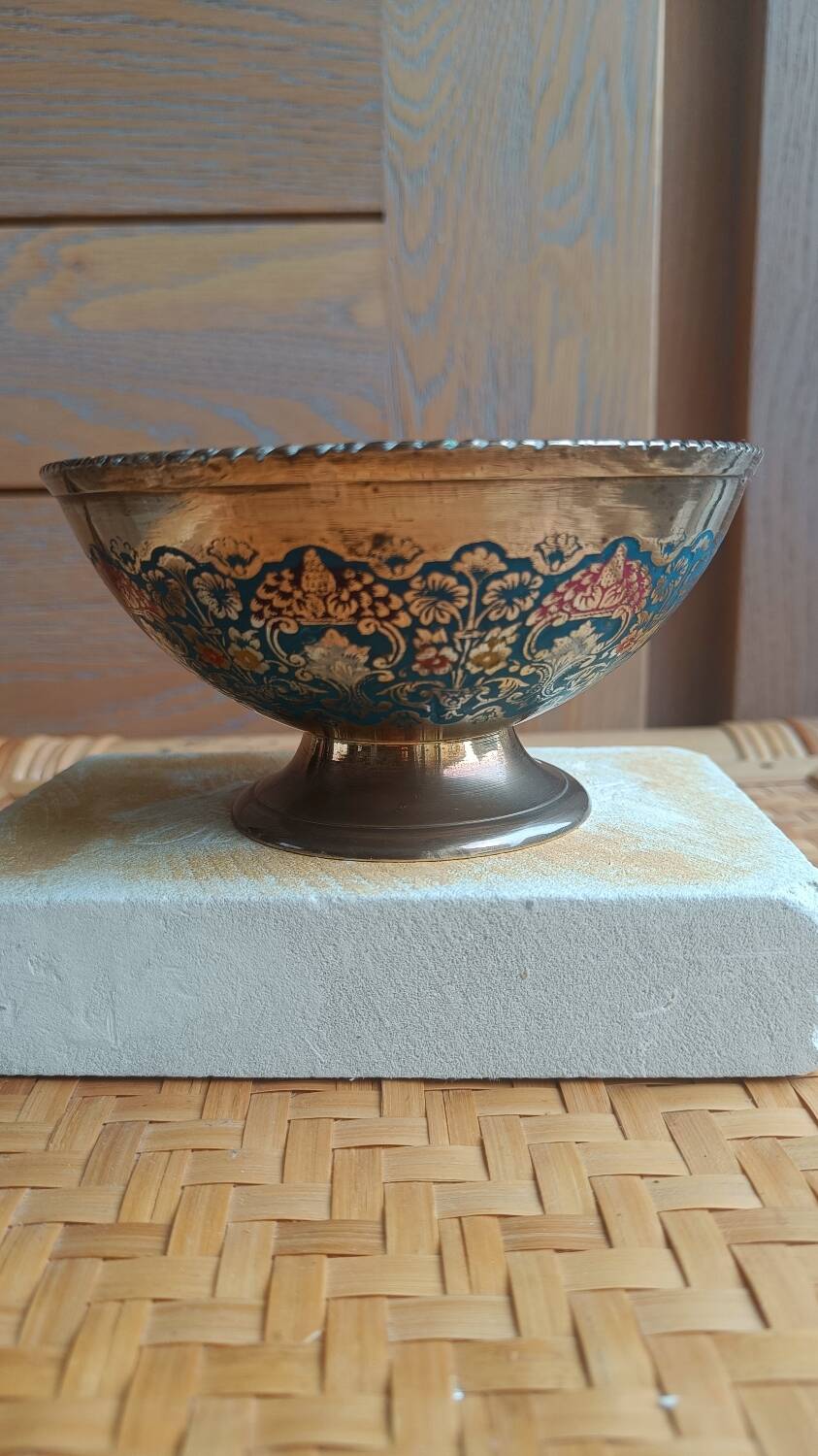 Brass footed bowl with coloured patterns