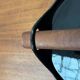 Black enamelled cast iron pot with a teak handle in mid-century style by Timo Sarpaneva for Rosenlew of Finland, 1960s.