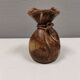 vase shaped like a money bag, in beautiful earthy colours.