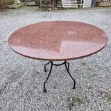 Round marble table with wrought iron base from the mid-20th century.