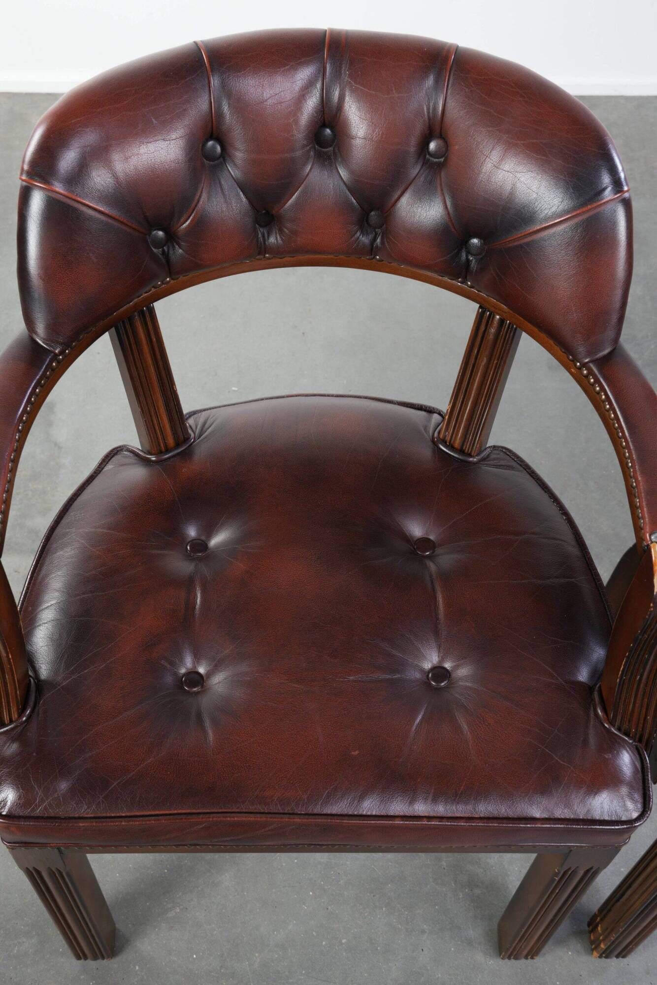 Set of two dark brown cowhide leather Chesterfield dining/side chairs