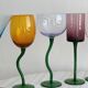6 colored glasses with twisted feet