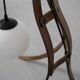 Sculptural table lamp with globe