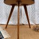 Pretty little vintage round table with tapered legs.