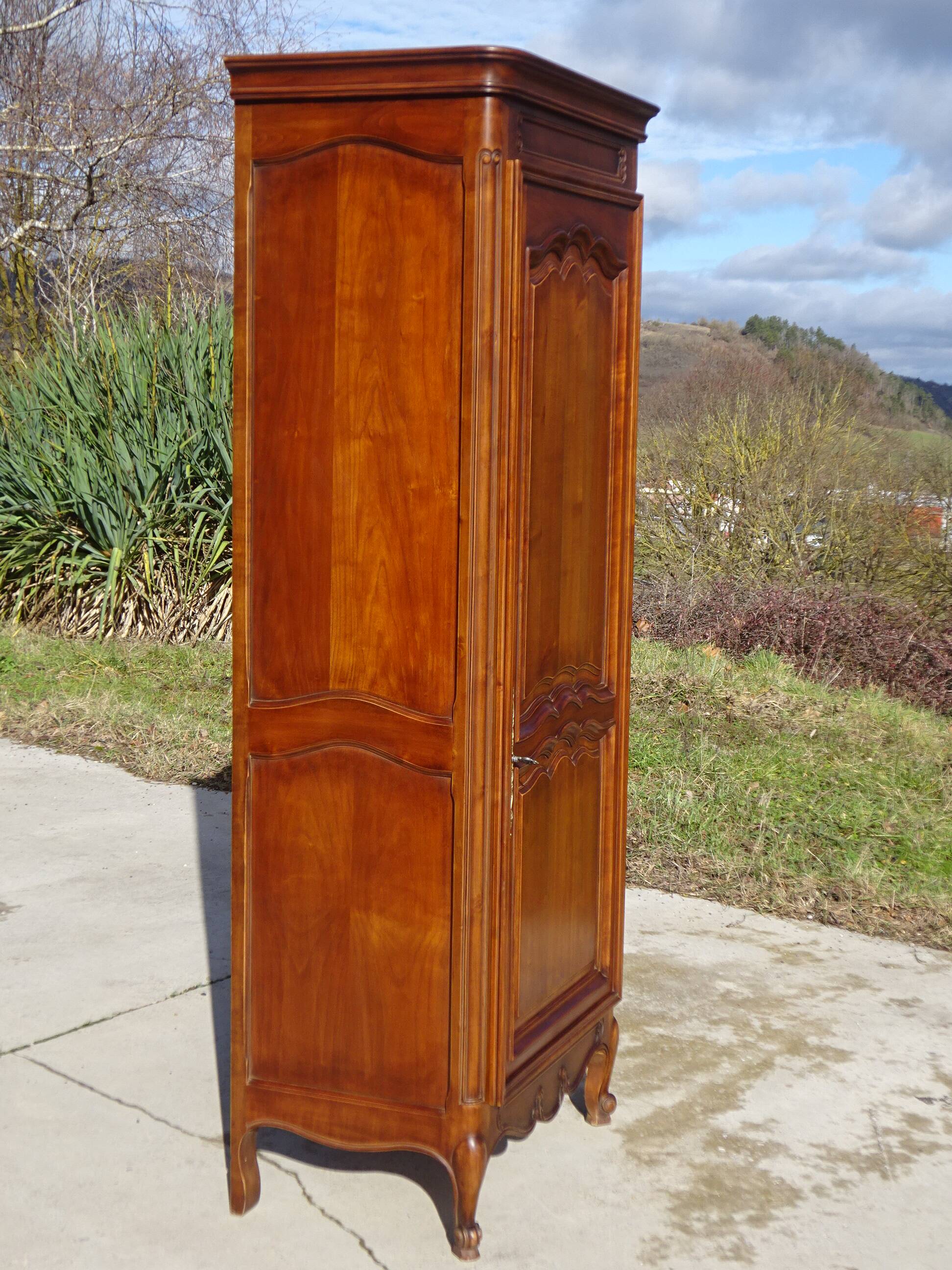 Louis XV style bonnetière in solid cherry wood
