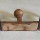Wall-mounted coat rack in solid wood - mid 20th century
