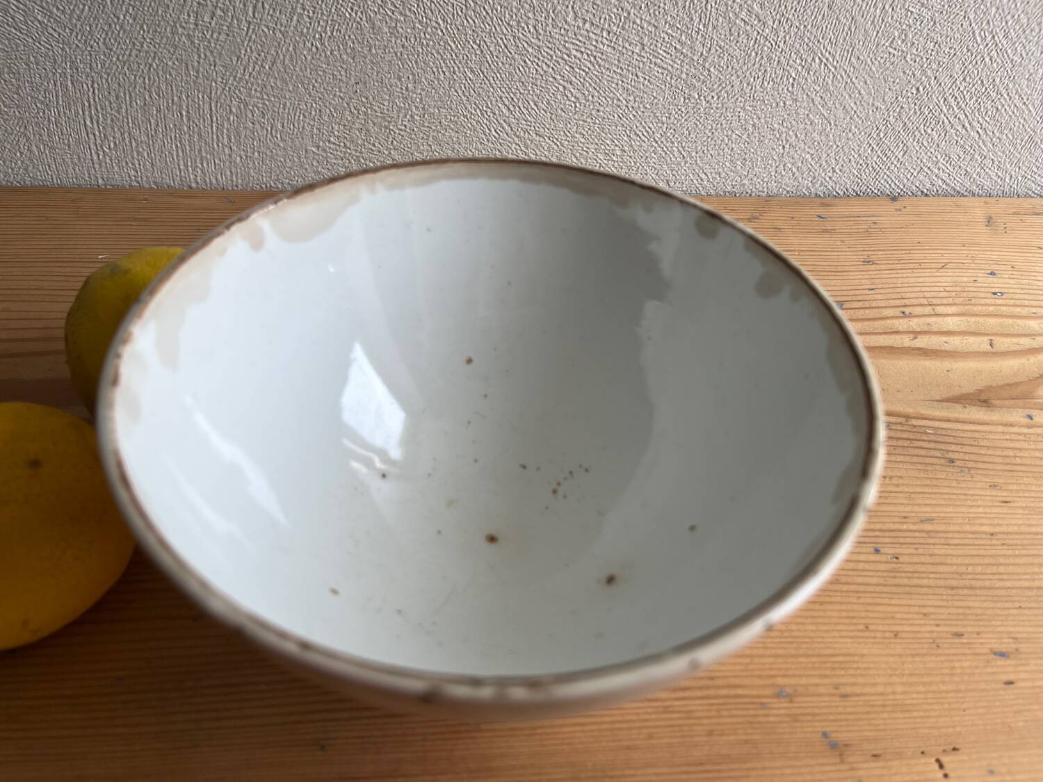 Old earthenware bowl on a pedestal, Badonviller, France.
