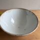 Old earthenware bowl on a pedestal, Badonviller, France.