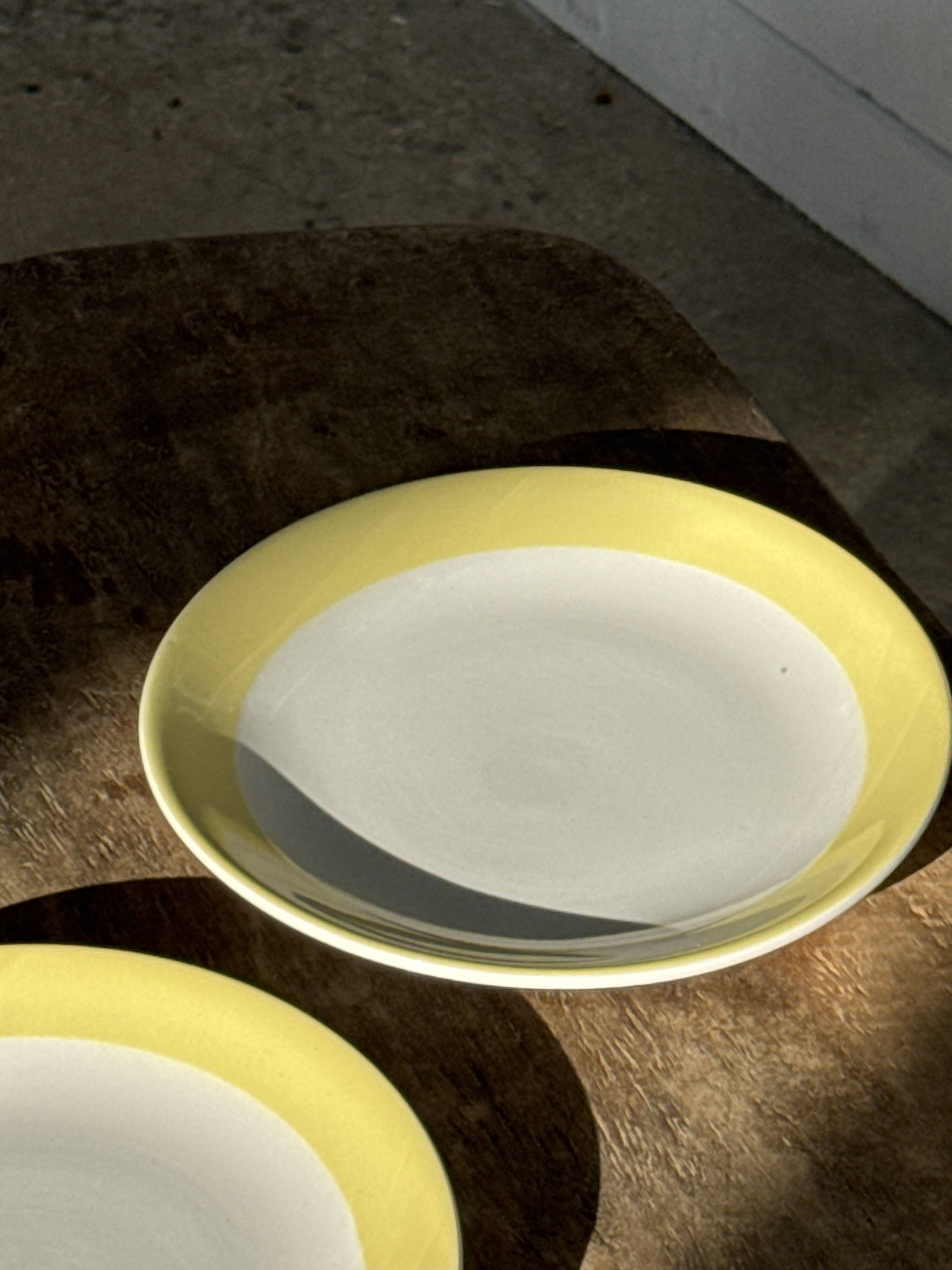 Set of 2 large plates with yellow rim, brand 12.