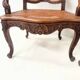 Paire de fauteuils de style Régence en bois naturel XIX siècle
