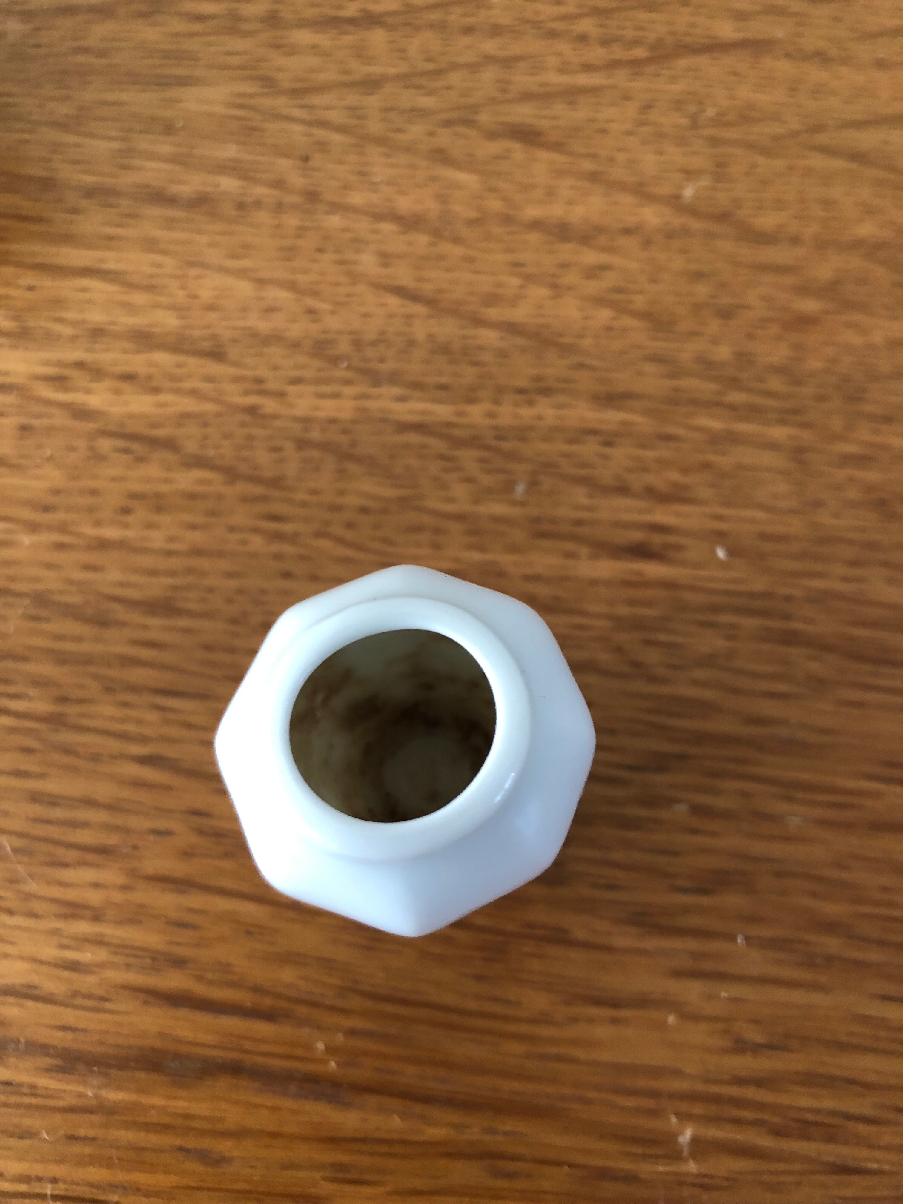 8 miniature vases in white earthenware