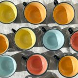 Vintage black earthenware coffee cups with multi-colored background, 1970s