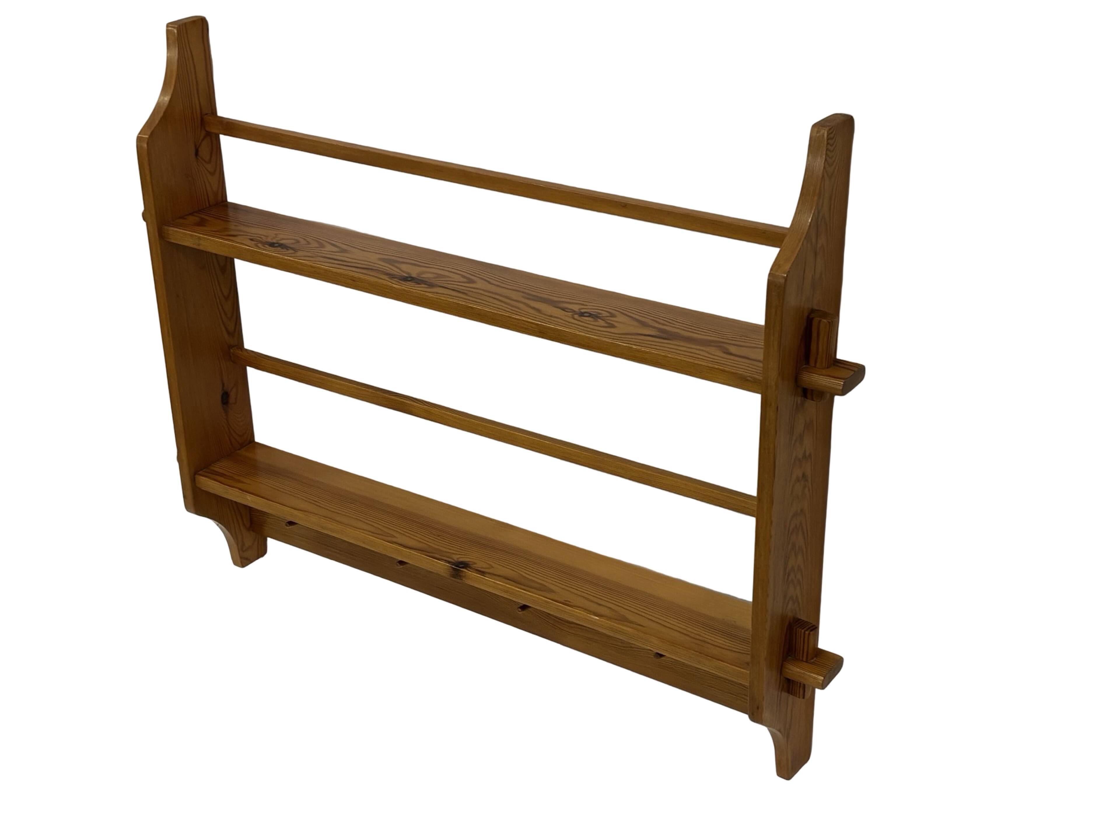 Vintage wooden wall shelve rack bookshelf in pinewood minimalist design