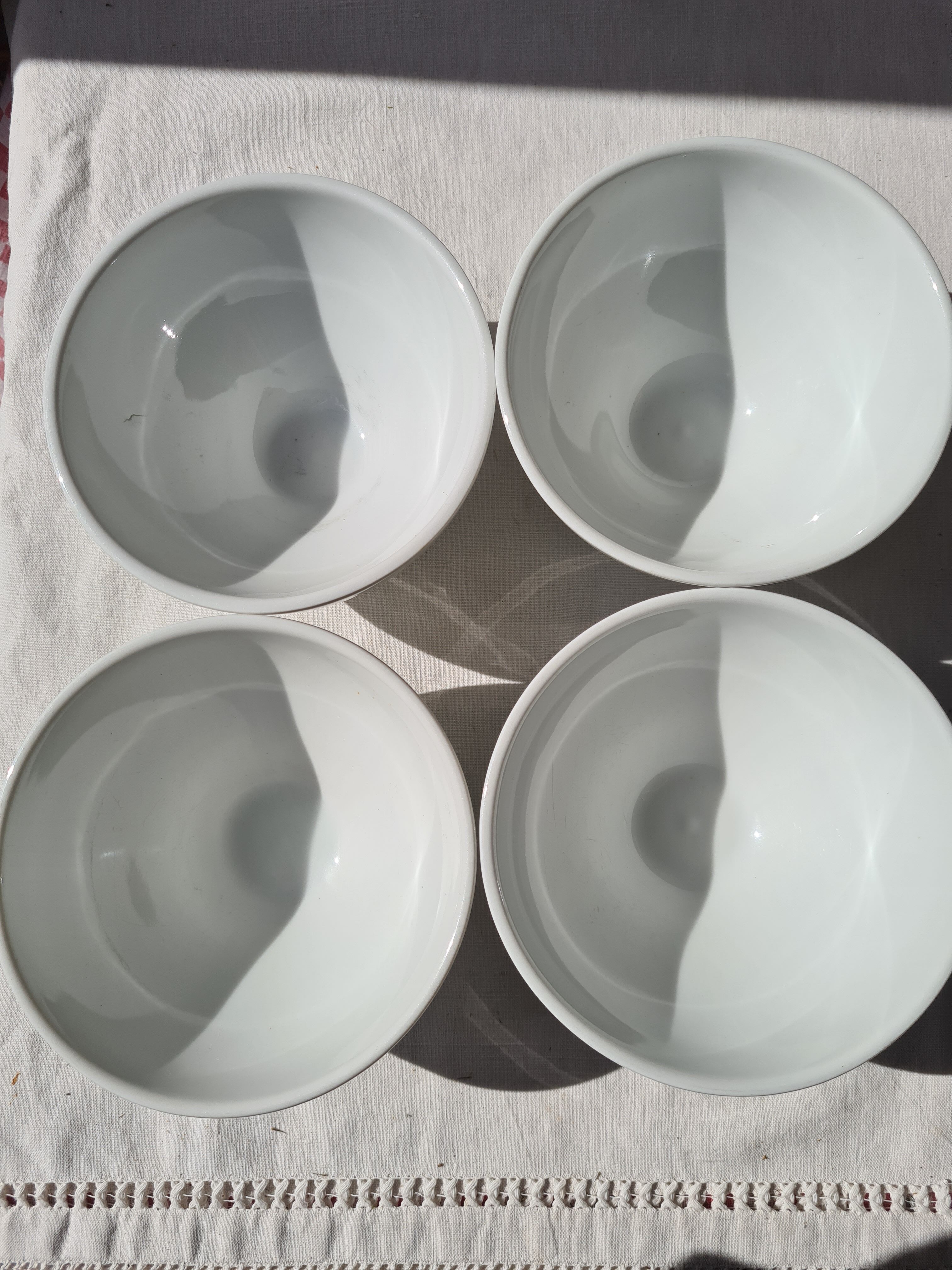 Four bowls made of thick white porcelain