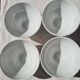 Four bowls made of thick white porcelain