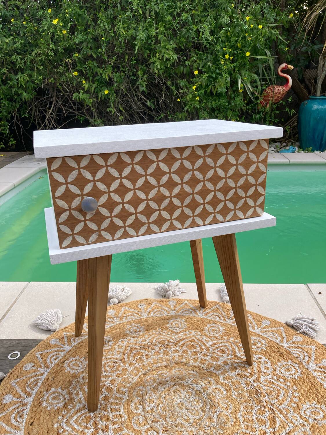 Beautiful vintage bedside table with tapered legs, Scandinavian/pop style in raw white.