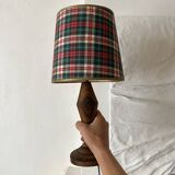 Turned wooden lamp, tartan lampshade.