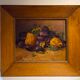 Still life with quetsches and pears signed and dated 1935