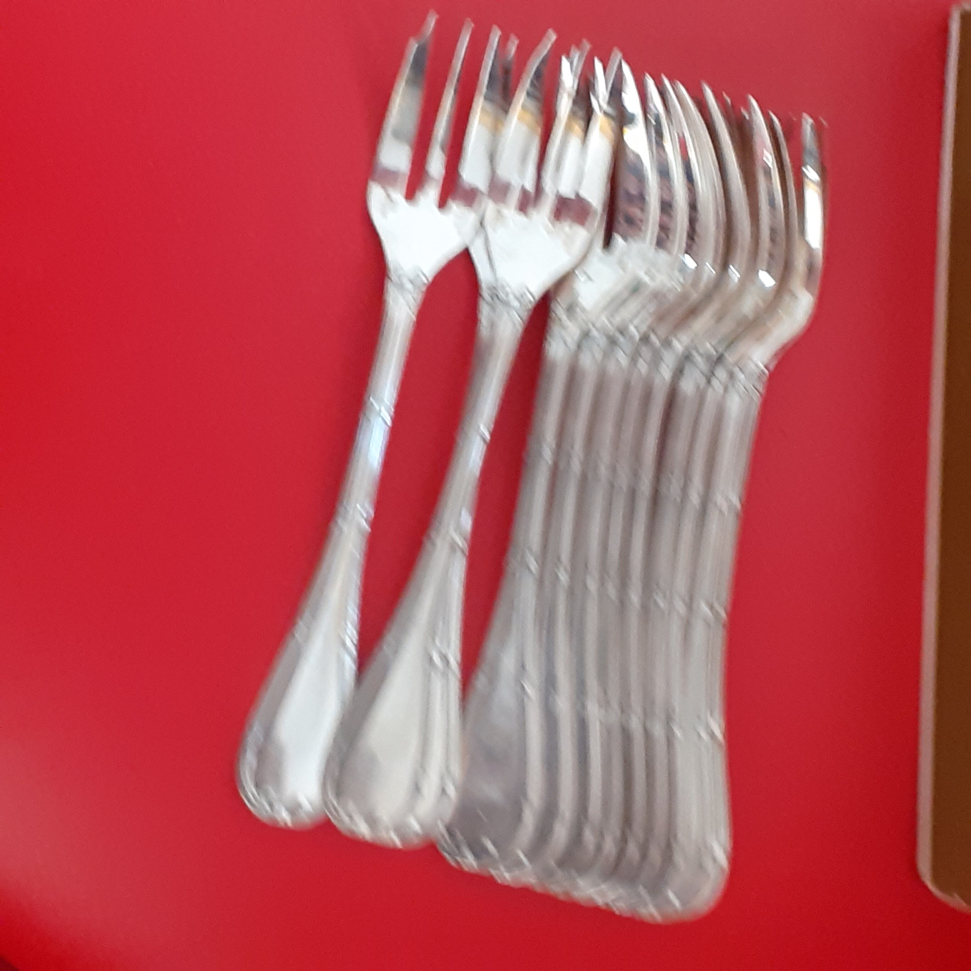 12 Christofle cake spoons. Ribbon template.